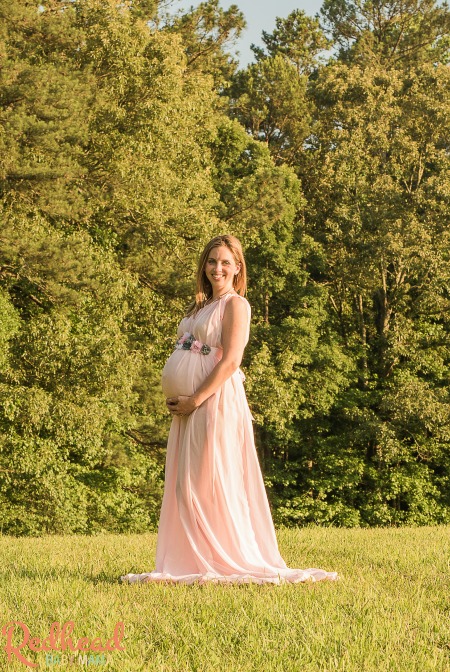 outdoor maternity shoot with a chiffon gown and sash