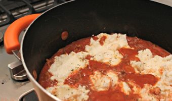 Ricotta cheese dots the top of the Stovetop Lasagna