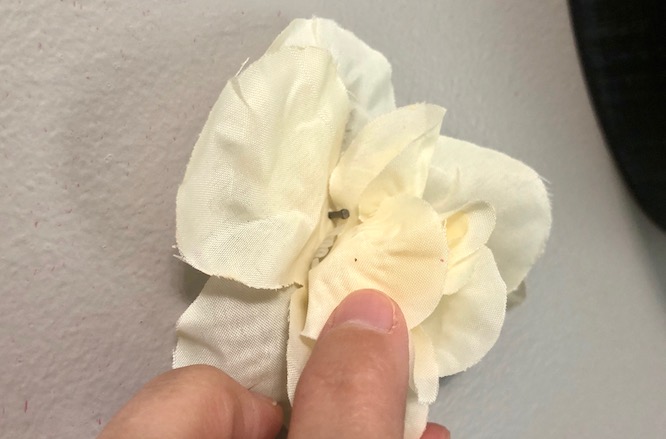 how to nail a flower to a wall