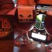 Ancient City Brewing Company coaster and beer goblet sit with a ghost meter